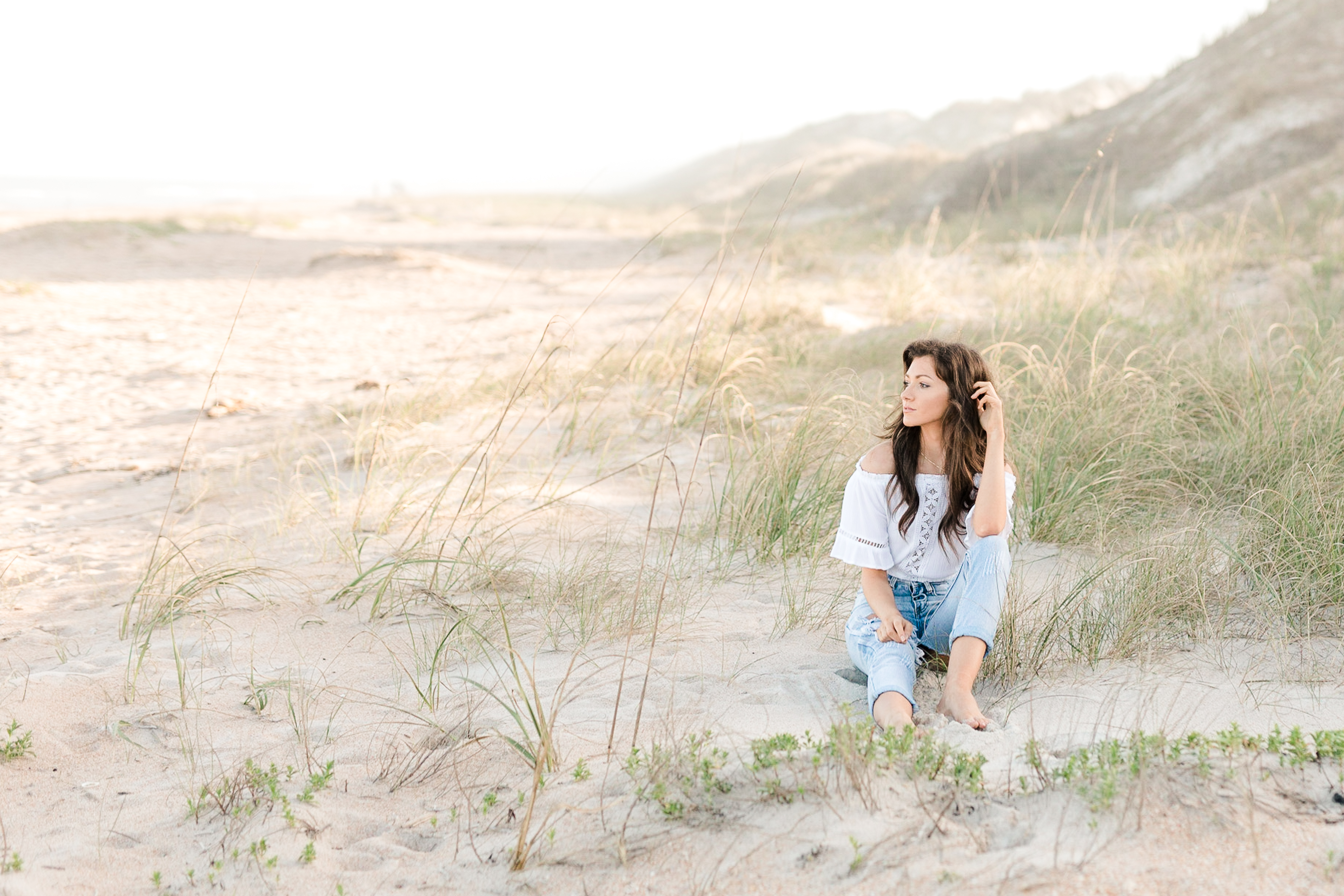 girl sitting on beach